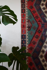 Vintage kilim rug in living room setting, bright colors, wild shaman, soft rug, bold color, Portland, Oregon, rug store, rug shop, local shop, vintage rug, modern kilim, warm colors