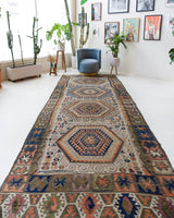 Vintage kilim rug in room decor setting, old rug, antique rug, pastel colors, faded colors, Turkish rug, vintage rug, soft rug, Portland, Oregon, rug store, rug shop, local shop, bold colors, bright colors, faded colors