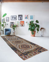 Vintage kilim rug in room decor setting, old rug, antique rug, pastel colors, faded colors, Turkish rug, vintage rug, soft rug, Portland, Oregon, rug store, rug shop, local shop, bold colors, bright colors, faded colors