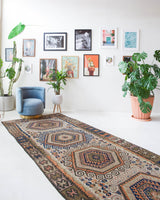 Vintage kilim rug in room decor setting, old rug, antique rug, pastel colors, faded colors, Turkish rug, vintage rug, soft rug, Portland, Oregon, rug store, rug shop, local shop, bold colors, bright colors, faded colors