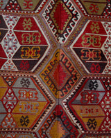 Vintage kilim rug in living room setting, bright colors, wild shaman, soft rug, bold color, Portland, Oregon, rug store, rug shop, local shop, vintage rug, modern kilim, warm colors