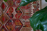 Vintage kilim rug in living room setting, bright colors, wild shaman, soft rug, bold color, Portland, Oregon, rug store, rug shop, local shop, vintage rug, modern kilim, warm colors