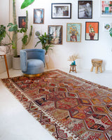 Vintage kilim rug in living room setting, bright colors, wild shaman, soft rug, bold color, Portland, Oregon, rug store, rug shop, local shop, vintage rug, modern kilim, warm colors
