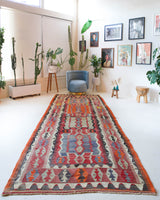 Vintage kilim rug in living room setting, bright colors, wild shaman, soft rug, bold color, Portland, Oregon, rug store, rug shop, local shop, vintage rug, modern kilim, warm colors