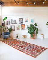 Vintage kilim rug in living room setting, bright colors, wild shaman, soft rug, bold color, Portland, Oregon, rug store, rug shop, local shop, vintage rug, modern kilim, warm colors