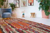 Vintage kilim rug in living room setting, bright colors, wild shaman, soft rug, bold color, Portland, Oregon, rug store, rug shop, local shop, vintage rug, modern kilim, warm colors