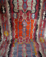 Vintage kilim rug in living room setting, bright colors, wild shaman, soft rug, bold color, Portland, Oregon, rug store, rug shop, local shop, vintage rug, modern kilim, warm colors