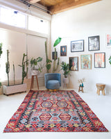 Vintage kilim rug in living room setting, bright colors, wild shaman, soft rug, bold color, Portland, Oregon, rug store, rug shop, local shop, vintage rug, modern kilim, warm colors