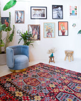 Vintage kilim rug in living room setting, bright colors, wild shaman, soft rug, bold color, Portland, Oregon, rug store, rug shop, local shop, vintage rug, modern kilim, warm colors