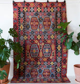 Vintage kilim rug in living room setting, bright colors, wild shaman, soft rug, bold color, Portland, Oregon, rug store, rug shop, local shop, vintage rug, modern kilim, warm colors