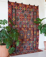 Vintage kilim rug in living room setting, bright colors, wild shaman, soft rug, bold color, Portland, Oregon, rug store, rug shop, local shop, vintage rug, modern kilim, warm colors