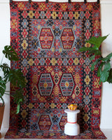 Vintage kilim rug in living room setting, bright colors, wild shaman, soft rug, bold color, Portland, Oregon, rug store, rug shop, local shop, vintage rug, modern kilim, warm colors