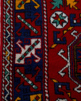 Vintage Turkish rug in a living room setting, pile rug, Turkish rug, vintage rug, portland, rug shop, bright colors, wild shaman, soft rug, bold color, Portland, Oregon, rug store, rug shop, local shop, antique rug