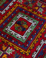 Vintage Turkish rug in a living room setting, pile rug, Turkish rug, vintage rug, portland, rug shop, bright colors, wild shaman, soft rug, bold color, Portland, Oregon, rug store, rug shop, local shop, antique rug