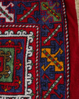 Vintage Turkish rug in a living room setting, pile rug, Turkish rug, vintage rug, portland, rug shop, bright colors, wild shaman, soft rug, bold color, Portland, Oregon, rug store, rug shop, local shop, antique rug