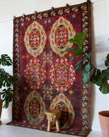 Vintage kilim rug in room decor setting, old rug, antique rug, pastel colors, faded colors, Turkish rug, vintage rug, soft rug, Portland, Oregon, rug store, rug shop, local shop, bold colors, bright colors, faded colors