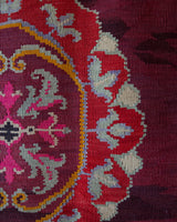 Vintage kilim rug in room decor setting, old rug, antique rug, pastel colors, faded colors, Turkish rug, vintage rug, soft rug, Portland, Oregon, rug store, rug shop, local shop, bold colors, bright colors, faded colors