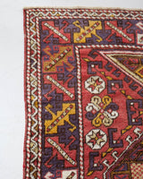 Vintage Turkish rug in living room setting, old rug, antique rug, pastel colors, faded colors, Turkish rug, vintage rug, soft rug, Portland, Oregon, rug store, rug shop, local shop