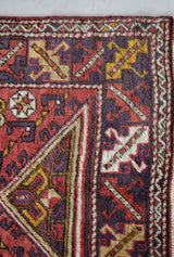 Vintage Turkish rug in living room setting, old rug, antique rug, pastel colors, faded colors, Turkish rug, vintage rug, soft rug, Portland, Oregon, rug store, rug shop, local shop