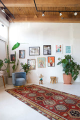 Vintage kilim rug in room decor setting, old rug, antique rug, pastel colors, faded colors, Turkish rug, vintage rug, soft rug, Portland, Oregon, rug store, rug shop, local shop, bold colors, bright colors, faded colors