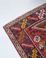 Vintage Turkish rug in living room setting, old rug, antique rug, pastel colors, faded colors, Turkish rug, vintage rug, soft rug, Portland, Oregon, rug store, rug shop, local shop