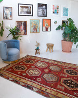 Vintage kilim rug in room decor setting, old rug, antique rug, pastel colors, faded colors, Turkish rug, vintage rug, soft rug, Portland, Oregon, rug store, rug shop, local shop, bold colors, bright colors, faded colors