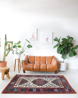 Vintage Turkish rug in a living room setting, pile rug, Turkish rug, vintage rug, portland, rug shop, bright colors, wild shaman, soft rug, bold color, Portland, Oregon, rug store, rug shop, local shop, antique rug