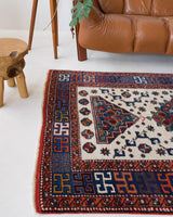 Vintage Turkish rug in a living room setting, pile rug, Turkish rug, vintage rug, portland, rug shop, bright colors, wild shaman, soft rug, bold color, Portland, Oregon, rug store, rug shop, local shop, antique rug