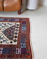 Vintage Turkish rug in a living room setting, pile rug, Turkish rug, vintage rug, portland, rug shop, bright colors, wild shaman, soft rug, bold color, Portland, Oregon, rug store, rug shop, local shop, antique rug
