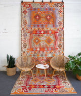 orange, green, bright color, antique, oushak rug, portland rug shop, rug store, wild shaman