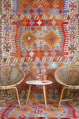 orange, green, bright color, antique, oushak rug, portland rug shop, rug store, wild shaman