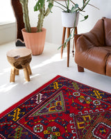 Vintage Turkish rug in a living room setting, pile rug, Turkish rug, vintage rug, portland, rug shop, bright colors, wild shaman, soft rug, bold color, Portland, Oregon, rug store, rug shop, local shop, antique rug