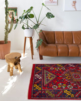 Vintage Turkish rug in a living room setting, pile rug, Turkish rug, vintage rug, portland, rug shop, bright colors, wild shaman, soft rug, bold color, Portland, Oregon, rug store, rug shop, local shop, antique rug