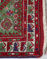 Vintage Turkish rug in a living room setting, pile rug, Turkish rug, vintage rug, portland, rug shop, bright colors, wild shaman, soft rug, bold color, Portland, Oregon, rug store, rug shop, local shop, antique rug, earthy colors