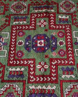 Vintage Turkish rug in a living room setting, pile rug, Turkish rug, vintage rug, portland, rug shop, bright colors, wild shaman, soft rug, bold color, Portland, Oregon, rug store, rug shop, local shop, antique rug, earthy colors