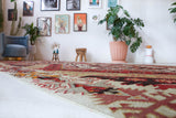 Vintage kilim rug in living room setting, old rug, antique rug, pastel colors, faded colors, Turkish rug, vintage rug, soft rug, Portland, Oregon, rug store, rug shop, local shop, earthy tones, earthy colors, warm colors