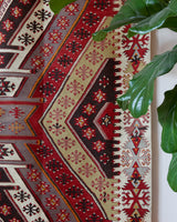 Vintage kilim rug in living room setting, old rug, antique rug, pastel colors, faded colors, Turkish rug, vintage rug, soft rug, Portland, Oregon, rug store, rug shop, local shop, earthy tones, earthy colors, warm colors