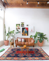 Vintage Turkish rug in a living room setting, pile rug, Turkish rug, vintage rug, portland, rug shop, bright colors, wild shaman, soft rug, bold color, Portland, Oregon, rug store, rug shop, local shop