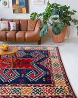 Vintage Turkish rug in a living room setting, pile rug, Turkish rug, vintage rug, portland, rug shop, bright colors, wild shaman, soft rug, bold color, Portland, Oregon, rug store, rug shop, local shop