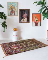 Vintage Turkish rug in a living room setting, pile rug, Turkish rug, vintage rug, portland, rug shop, bright colors, wild shaman, soft rug, bold color, Portland, Oregon, rug store, rug shop, local shop, antique rug