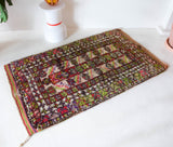 Vintage Turkish rug in a living room setting, pile rug, Turkish rug, vintage rug, portland, rug shop, bright colors, wild shaman, soft rug, bold color, Portland, Oregon, rug store, rug shop, local shop, antique rug