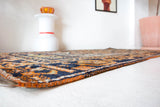 Vintage Turkish rug in a living room setting, pile rug, Turkish rug, vintage rug, portland, rug shop, bright colors, wild shaman, soft rug, bold color, Portland, Oregon, rug store, rug shop, local shop, antique rug