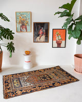 Vintage Turkish rug in a living room setting, pile rug, Turkish rug, vintage rug, portland, rug shop, bright colors, wild shaman, soft rug, bold color, Portland, Oregon, rug store, rug shop, local shop, antique rug