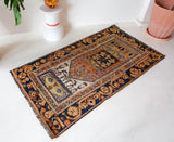 Vintage Turkish rug in a living room setting, pile rug, Turkish rug, vintage rug, portland, rug shop, bright colors, wild shaman, soft rug, bold color, Portland, Oregon, rug store, rug shop, local shop, antique rug