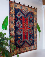 Vintage Turkish rug in a living room setting, pile rug, Turkish rug, vintage rug, portland, rug shop, bright colors, wild shaman, soft rug, bold color, Portland, Oregon, rug store, rug shop, local shop