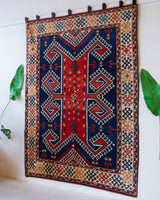 Vintage Turkish rug in a living room setting, pile rug, Turkish rug, vintage rug, portland, rug shop, bright colors, wild shaman, soft rug, bold color, Portland, Oregon, rug store, rug shop, local shop