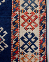 Vintage Turkish rug in a living room setting, pile rug, Turkish rug, vintage rug, portland, rug shop, bright colors, wild shaman, soft rug, bold color, Portland, Oregon, rug store, rug shop, local shop