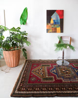 Vintage caucasian rug in a living room setting, pile rug, Turkish rug, vintage rug, portland, rug shop, bright colors, wild shaman, soft rug, bold color, Portland, Oregon, rug store, rug shop, local shop, soft rug, pastel colors, faded colors