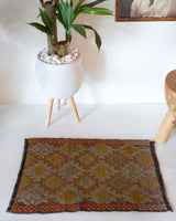 Vintage mini kilim rug in room decor setting, kilim, Turkish rug, vintage rug, portland, rug shop, bright colors, wild shaman, soft rug, bold color, Portland, Oregon, rug store, rug shop, local shop