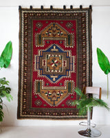 Vintage caucasian rug in a living room setting, pile rug, Turkish rug, vintage rug, portland, rug shop, bright colors, wild shaman, soft rug, bold color, Portland, Oregon, rug store, rug shop, local shop, soft rug, pastel colors, faded colors